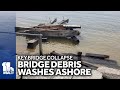 Key Bridge collapse debris washes ashore