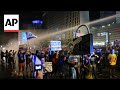 Scuffles as Israeli police use water cannon to disperse weekly anti-government protest in Tel Aviv