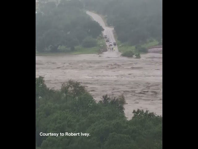 Timelapse shows speed of Texas floodwaters rising over causeway