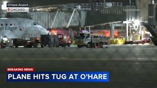 American Airlines plane strikes United tug at O'Hare, driver critically injured, officials say