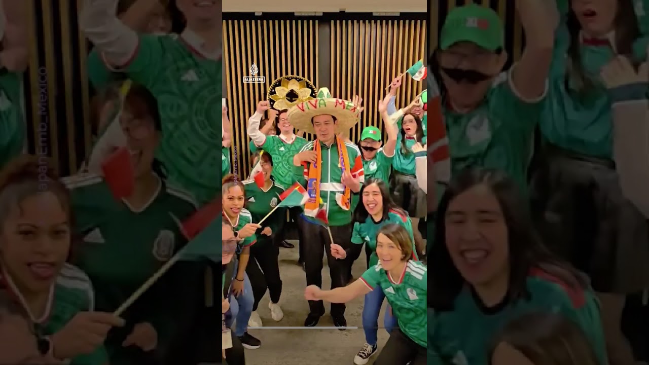 Fans of co-host Mexico celebrate reaching last 16