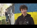 Artists spray-paint portraits of Alexei Navalny behind Soviet monument in Vienna  - 00:42 min - News - Video