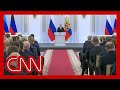 Hear what CNN reporter noticed about crowd watching Putins speech
