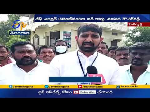 BJP workers try to stop TRS leader Kaushik Reddy from entering polling station in Ghanmukhla