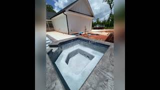 Aqua blue Pebble pool finishes. AlphaPools llc Atlanta