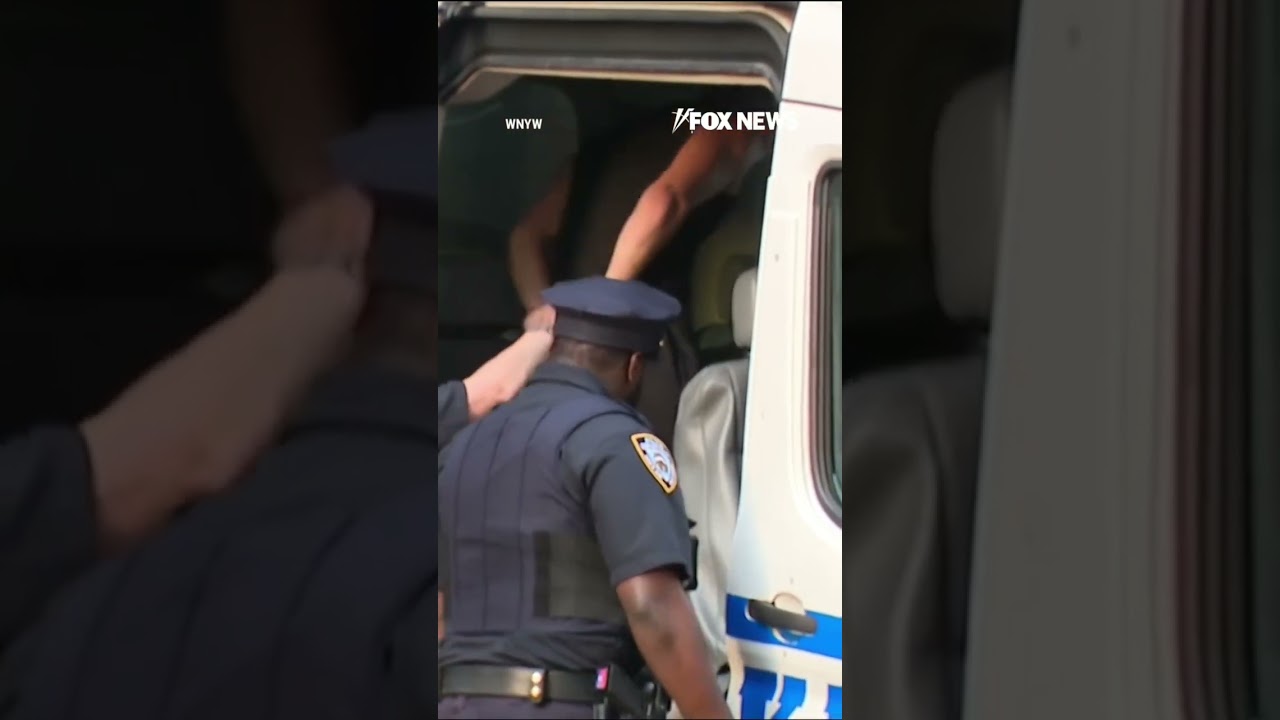 WATCH: Empire State Building climbers led away in perp walk #shorts #viral #nyc #empirestatebuilding