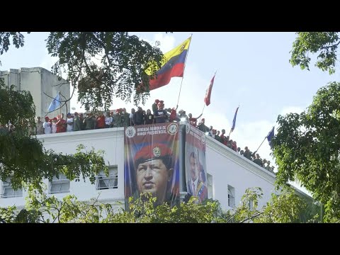 Nicolas Maduro supporters gather to celebrate first anniversary of reelection as president | AFP