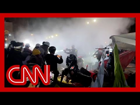 Police pull aside barricades and move in on UCLA encampment