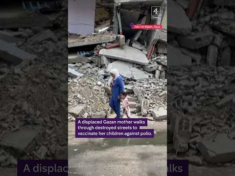 Gaza mother walks through rubble to vaccinate children