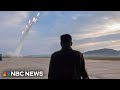 Video shows North Koreas Kim Jong Un watching multiple rocket launcher drill