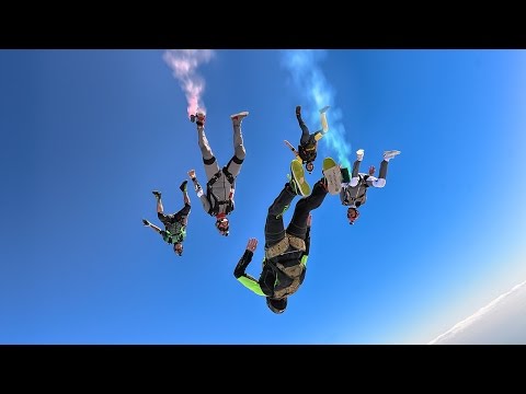 Skydiving with smoke at sunset and helicopter jumps. The best of Dec. 2016