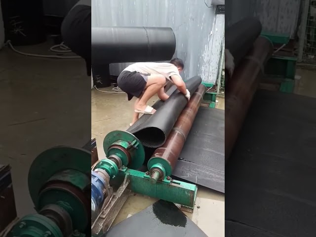 Rubber conveyor belt coiling process