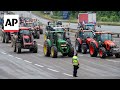 French and Spanish farmers block road on both sides of border in protest of EU policy