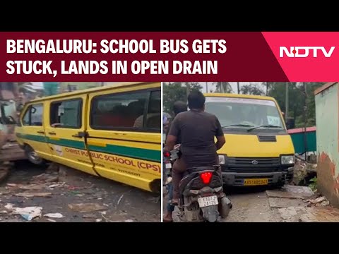 Bengaluru News | Another School Bus Gets Stuck On Bengaluru Roads, Lands Into An Open Drain