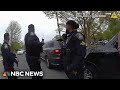 Police bodycam video captures students fleeing from a shooting incident
