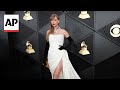 Taylor Swift wows in white on the Grammys 2024 red carpet