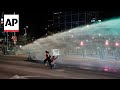 Water cannon used to disperse anti-government protesters in Tel Aviv