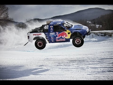 Head-to-head off-road truck race on snow - Red Bull Frozen Rush 