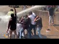 Godse Row: Police Deploy Water Cannons to Disperse DYFI Protestors | News9  - 01:47 min - News - Video