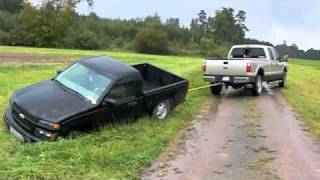Chevy pulling ford out mud #2