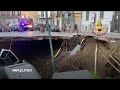 Sudden sinkhole in Naples swallows two cars, one parked and one in transit - 00:26 min - News - Video