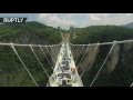Don't crack it! Worlds longest glass bottom bridge opens in Hunan, China