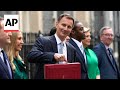 UK Chancellor Jeremy Hunt leaves Downing Street with red box ahead of delivering budget