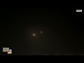 Glowing Objects Seen Flying at Israel as Iran Attacks | News9  - 01:01 min - News - Video