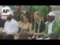 Harry and Meghan charm crowds on Nigeria visit as they join volleyball match