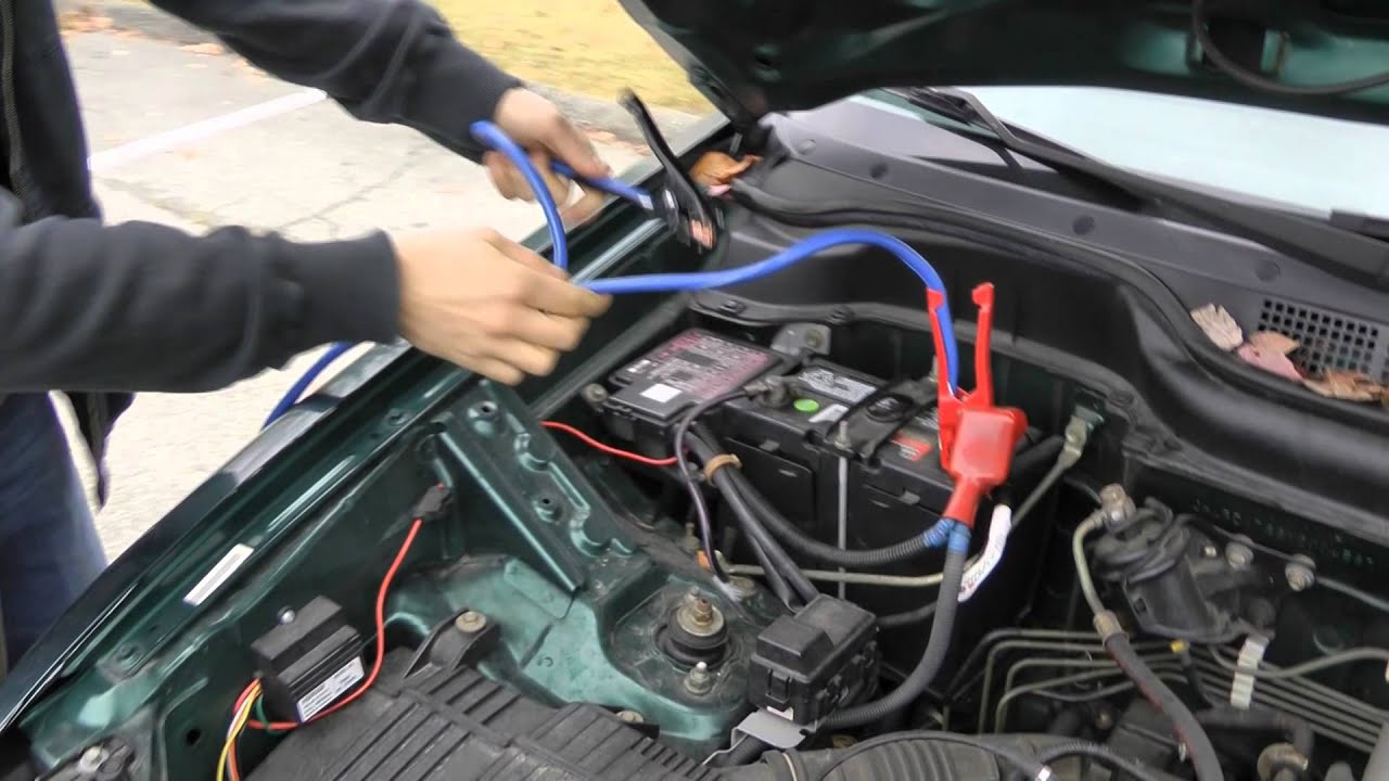 Where to connect jumper cables on bmw #5