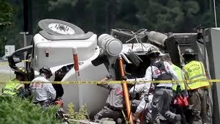 Rescuers extricate the driver from the cab of a truck involved in a multiple-vehicle collision on June 5, 2014, at U.S. 278 and Buck Island Road. The man was taken to a hospital in a helicopter.
