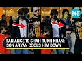 SRK loses cool after fan tries to grab his hand for selfie; Watch Aryan Khan's reaction