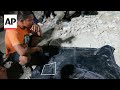 Bodies of a mother and child recovered from rubble after Philippines earthquake