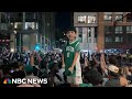 Fans flood the streets of Boston to celebrate the Celtics NBA win