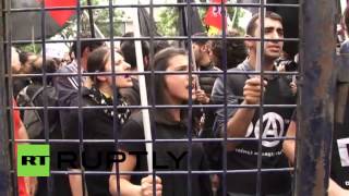 Video ID: 20140514-009

M/S Protesters break down barriers
M/S Protesters shouting anti-government slogans
M/S Police barricade
M/S Protesters in front of police barricade
M/S Man shouting 
M/S Man mo