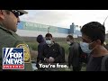 YOURE FREE: Video shows hundreds of migrants being released into US