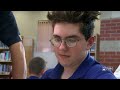 Custodian teaching students how to sweep their chess competition  - 02:00 min - News - Video