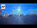 Drivers dash cam captures bright meteorite streaking across the night sky over Japan