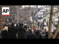 Alexei Navalny buried in Moscow as thousands attend funeral