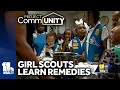 Girl Scouts making herbal cold remedy kits for homeless people