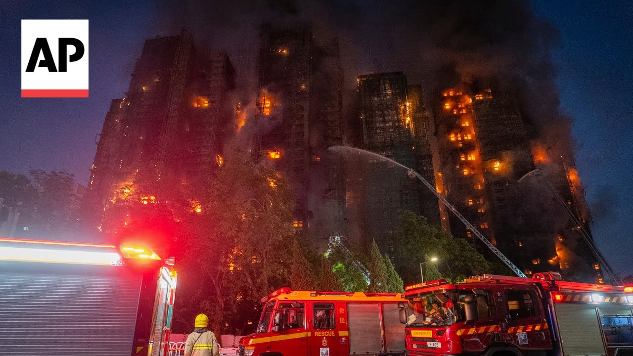 Hong Kong reels as high-rise fire leaves scores dead and burns through the night, AP explains