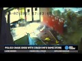 USA Today - Watch car crash into game store during police chase