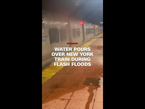 Watch water pour over New York train