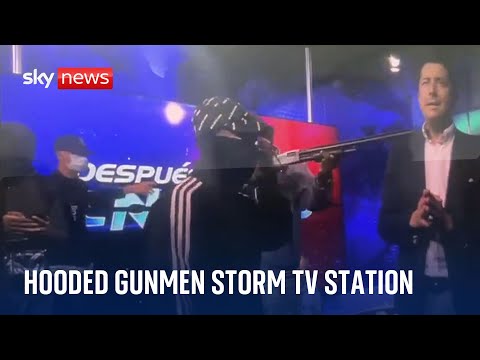Hooded gunmen burst onto live TV set in Ecuador after drug lord escape triggers state of emergency