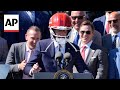 Biden jokes with Travis Kelce, wears Kansas City Chiefs helmet at White House