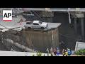 Giant sinkhole opens up in Bangkok street