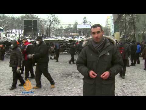 Ukraine police dismantle protest camps