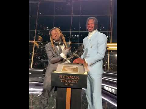 Lil Wayne and Travis Hunter with the Heisman Trophy 🔥 (via @cubuffs/IG)