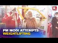 Never-seen moments: PM Modi attempts weightlifting while inspecting Major Dhyan Chand University