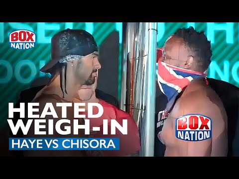 When David Haye & Derek Chisora Were Separated By A Steel Fence